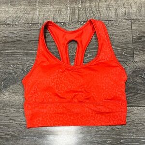 Women’s Red Racerback Sports Bra With Animal Print size medium